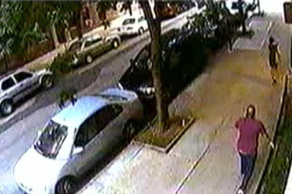 Surveillance video of Pena following the victim down the street